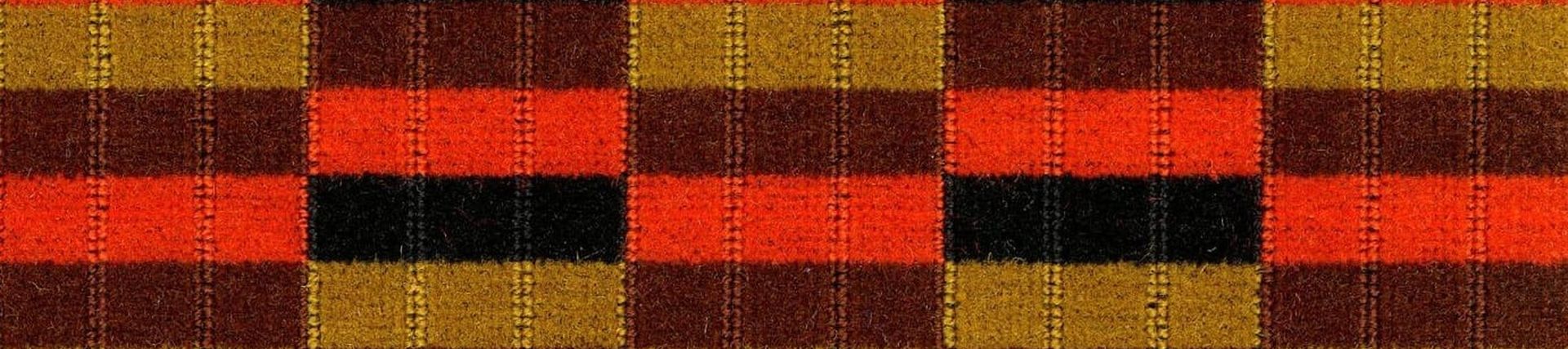 Brown, yellow and orange patterned moquette fabric